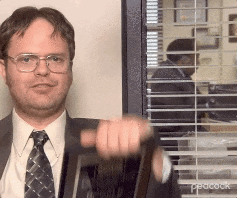 Dwight being very proud of his awards