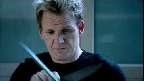 man sharpening knives