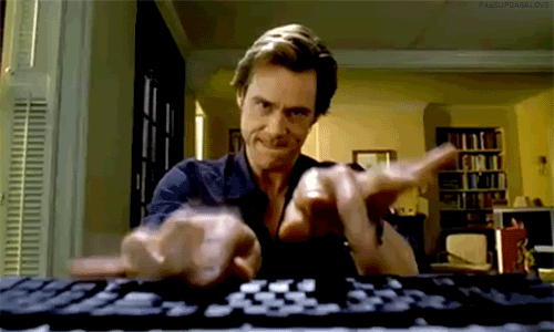 Bruce Almighty typing on keyboard
