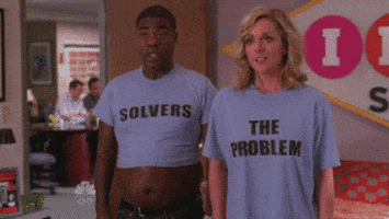 wearing problem solvers t-shirt