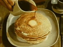 pouring syrup on pancakes gif
