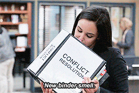 woman smelling a new binder