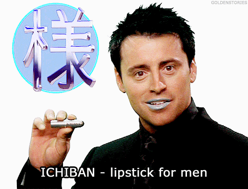 a man holding a chapstick GIF