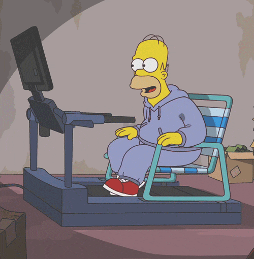 man sitting in a chair over a treadmill