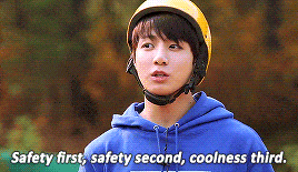 a boy with a helmet on saying safety first, safety second, coolness third