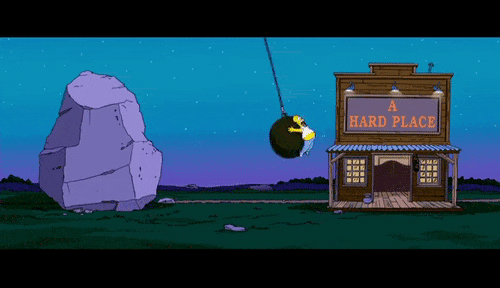 Homer Simpson swinging back and forth on a wrecking ball