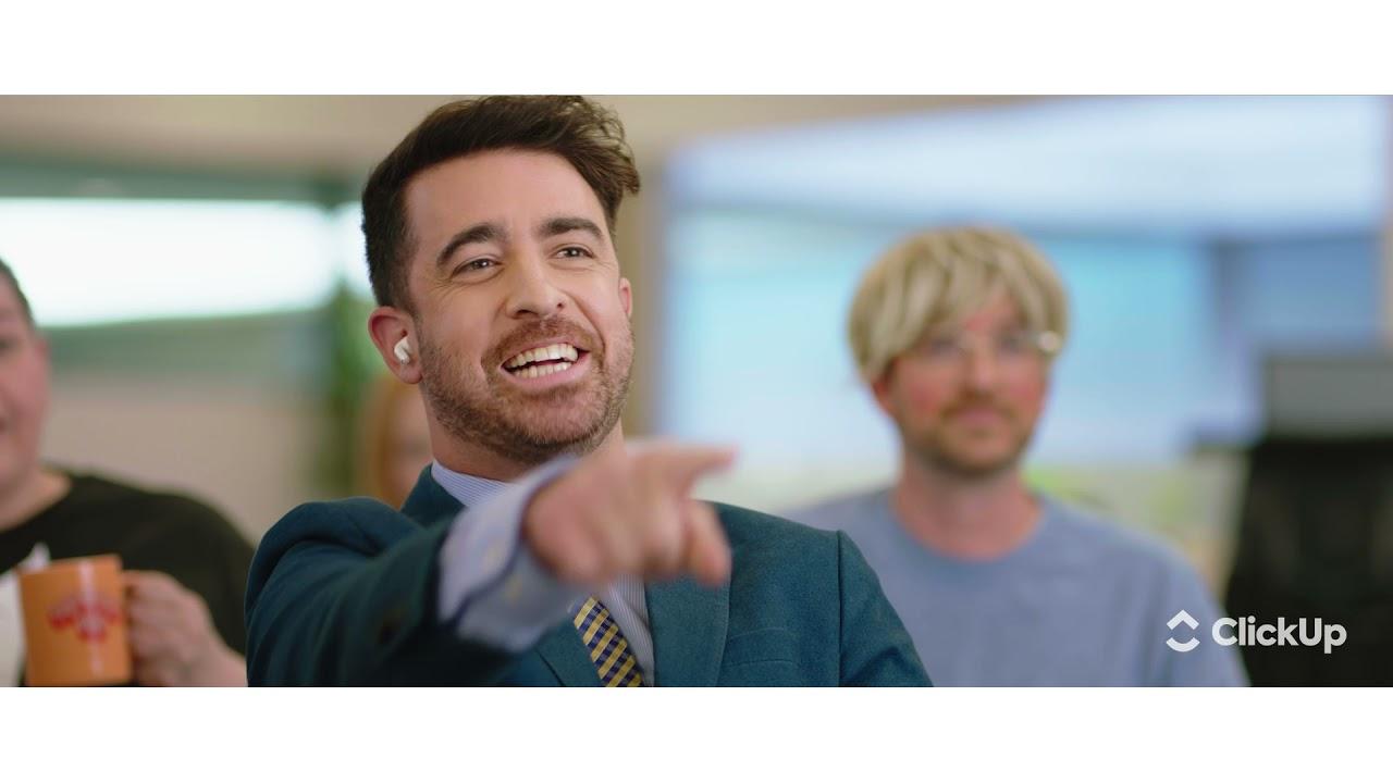 Pointing at a whiteboard with updated