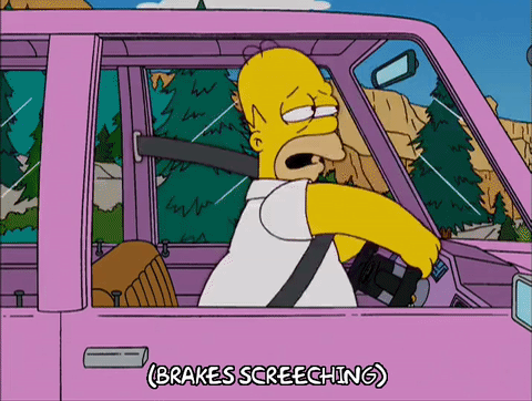 Homer Simpson driving a car