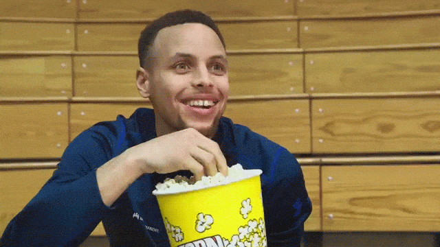 Stephen Curry eating popcorn