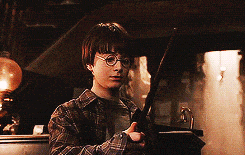 Harry holding his wand for the first time, simple sparkles