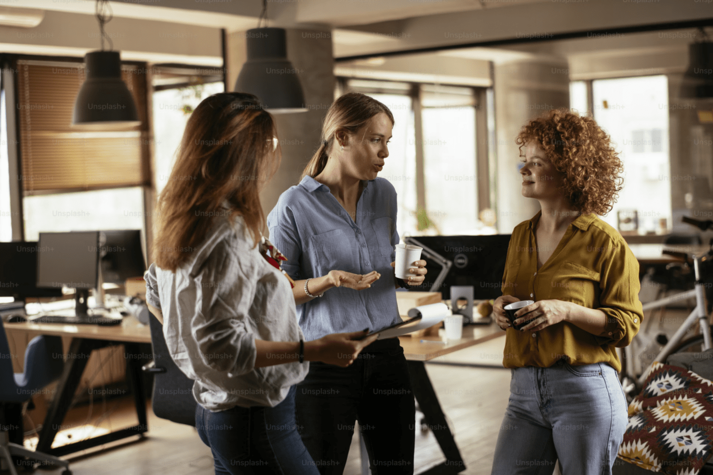 Colleagues interacting in an office