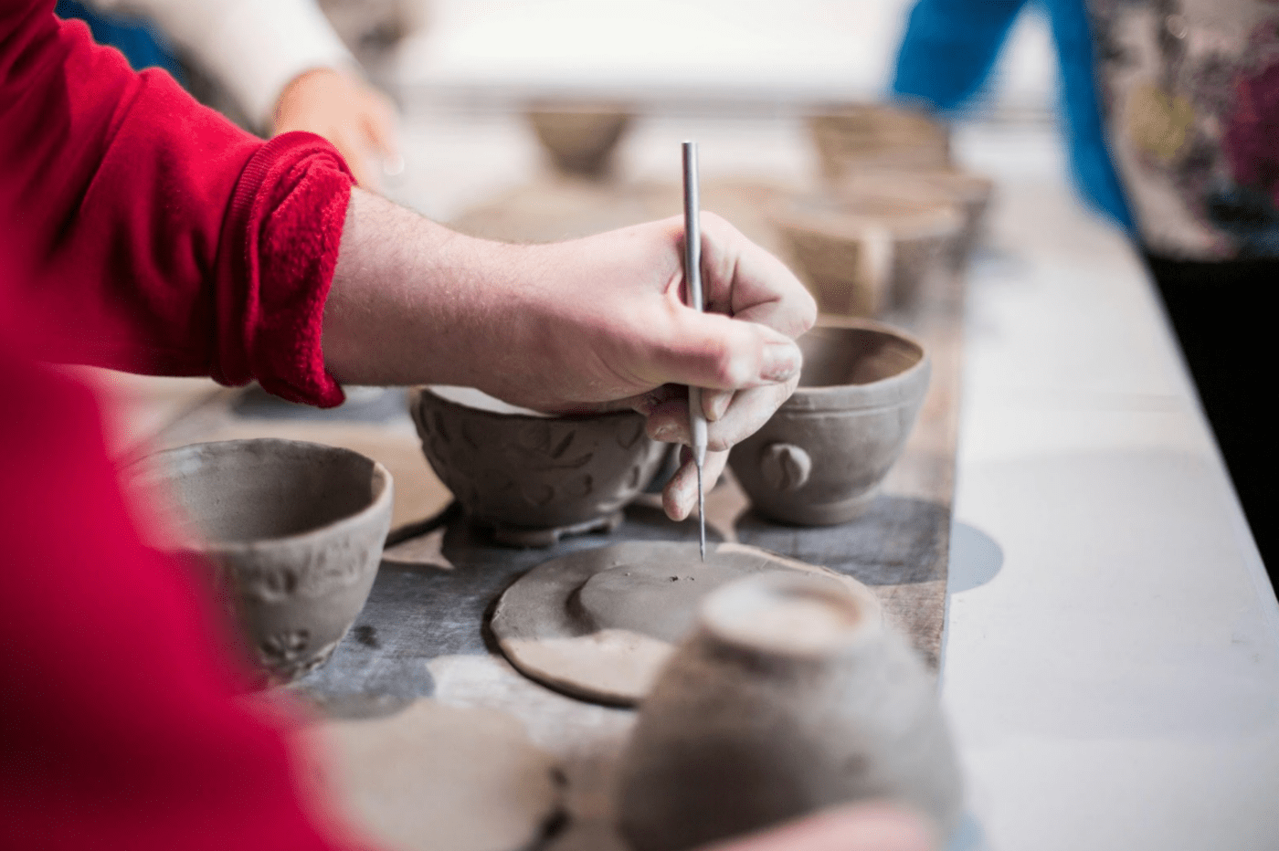 Person doing pottery