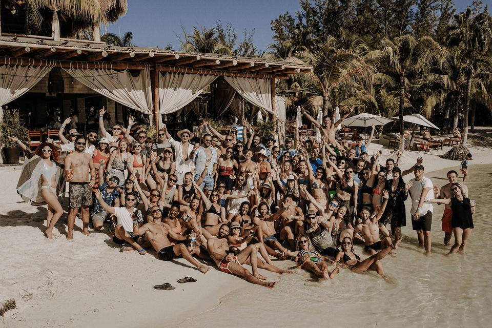 Group photo of people on a beach