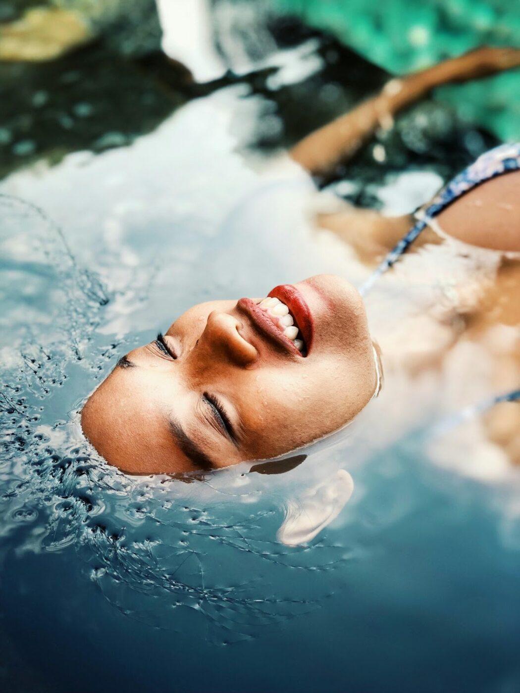 Woman floating in water